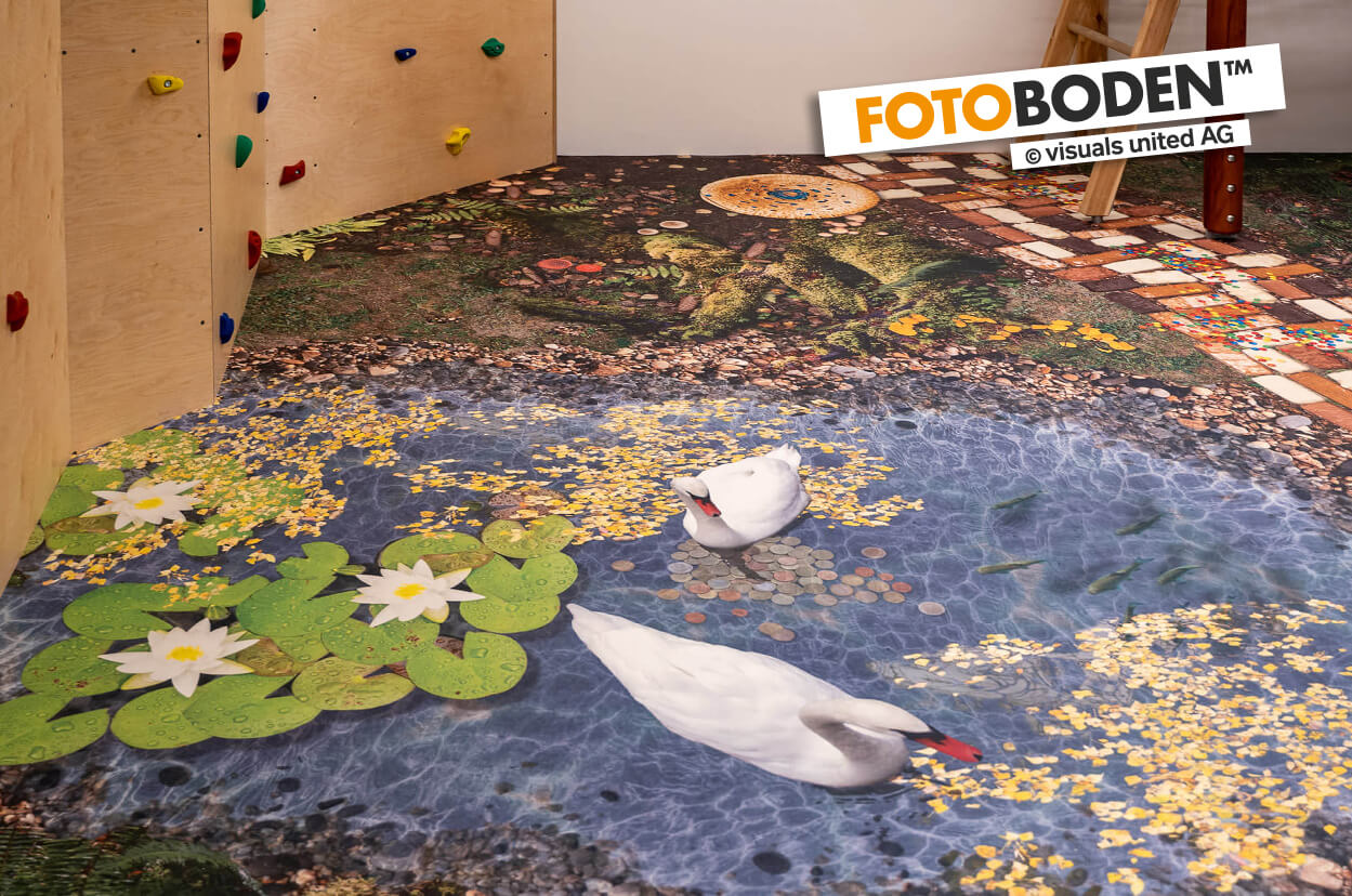 Indoor Spielplatz mit individuell bedrucktem FOTOBODEN™ im Märchenwald-Design auf dem Euroflex Fallschutzsystem von Kraiburg.